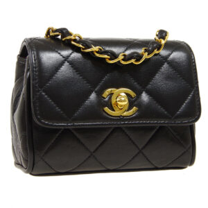 Chanel Timeless Mini, black leather,cross body bag, quilted effect, gold plated metal attributes.