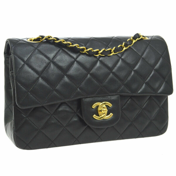 Chanel Classic Timeless, black leather, double flap, double chain quilted, effect, gold plated metal attributes.